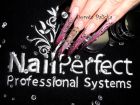Nails done using Nail Perfect Professional System products.<br />Nail Perfect manicure towel.